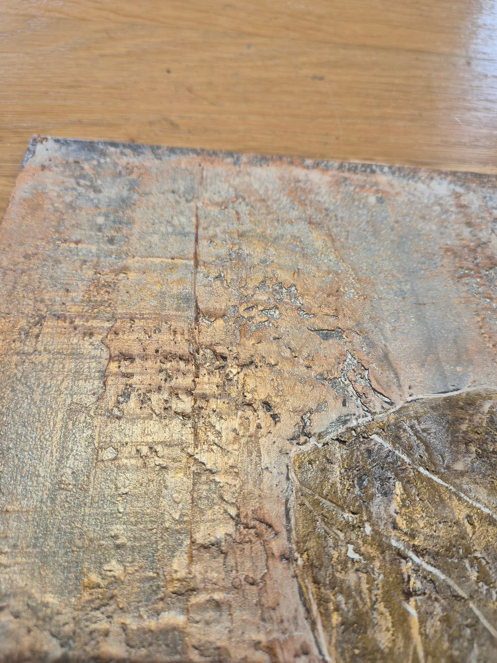 Original painting detail with gold and grey tones