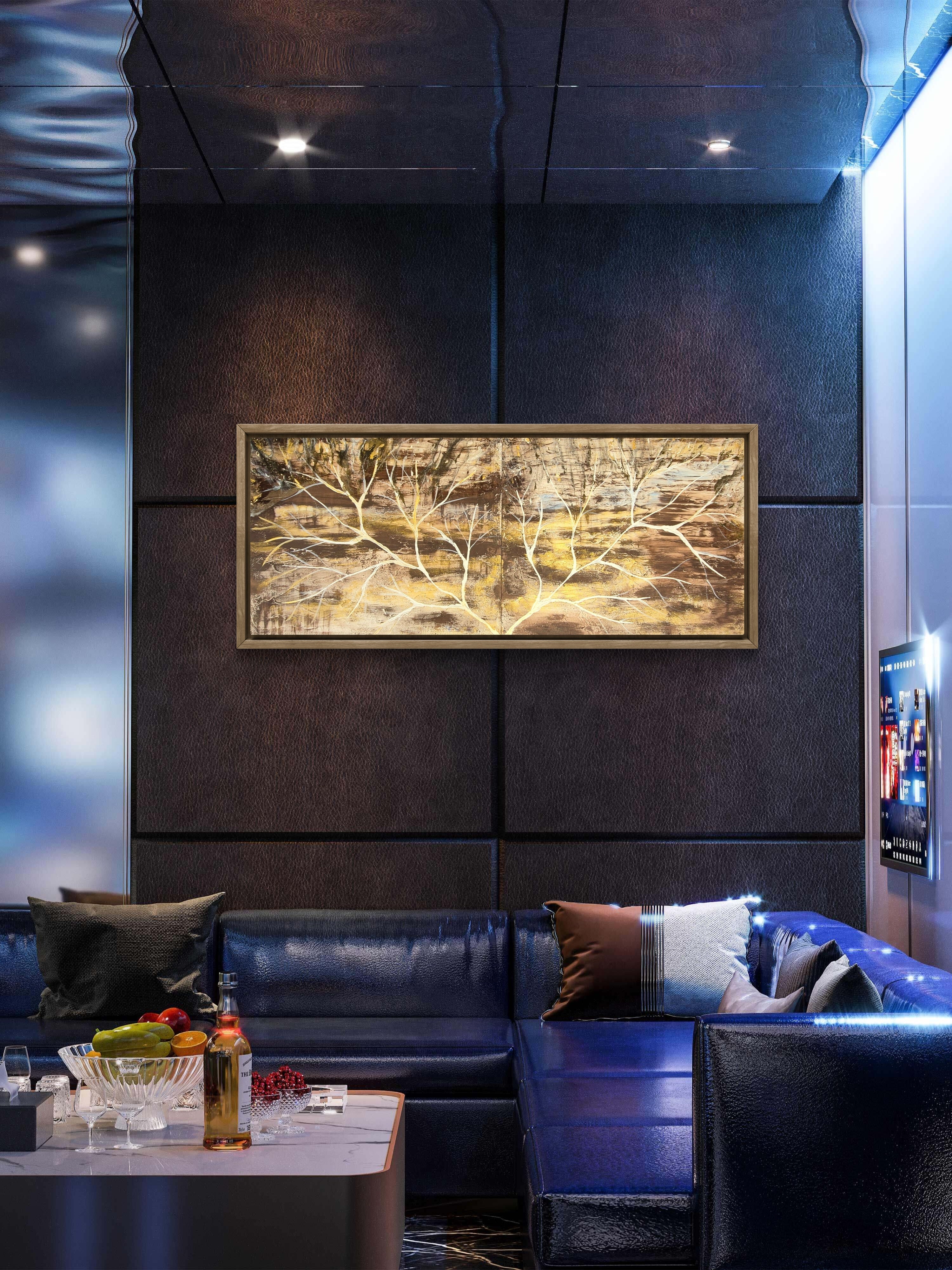 Golden Threshold diptych styled above leather sofa in dark luxury lounge